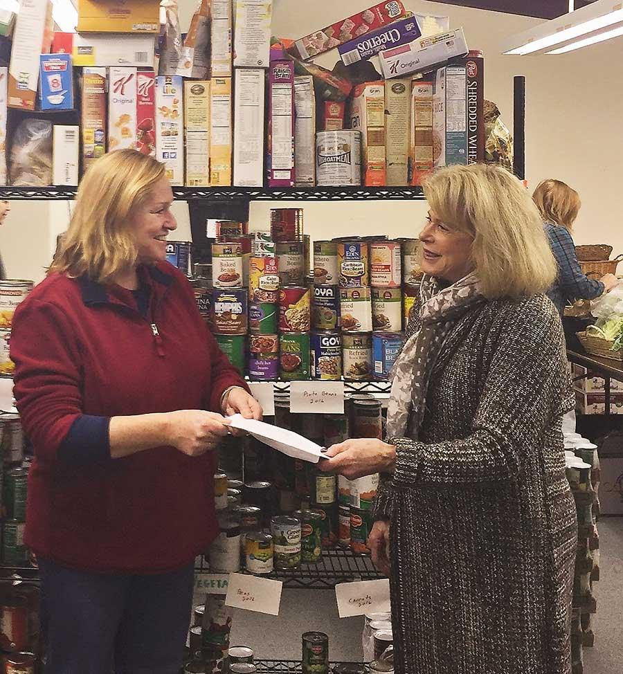 Carole presented a Foundation check to Narberth Community Food Bank director Gigi Tevlin-Moffat.